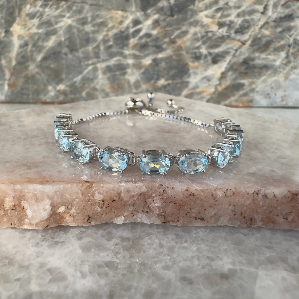 Pulsera de plata ajustable con topacio azul natural